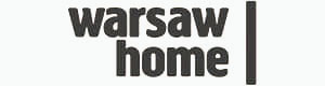 Czarny napis przedstawiający logotyp targów wnętrzarskich Warsaw Home na białym tle.